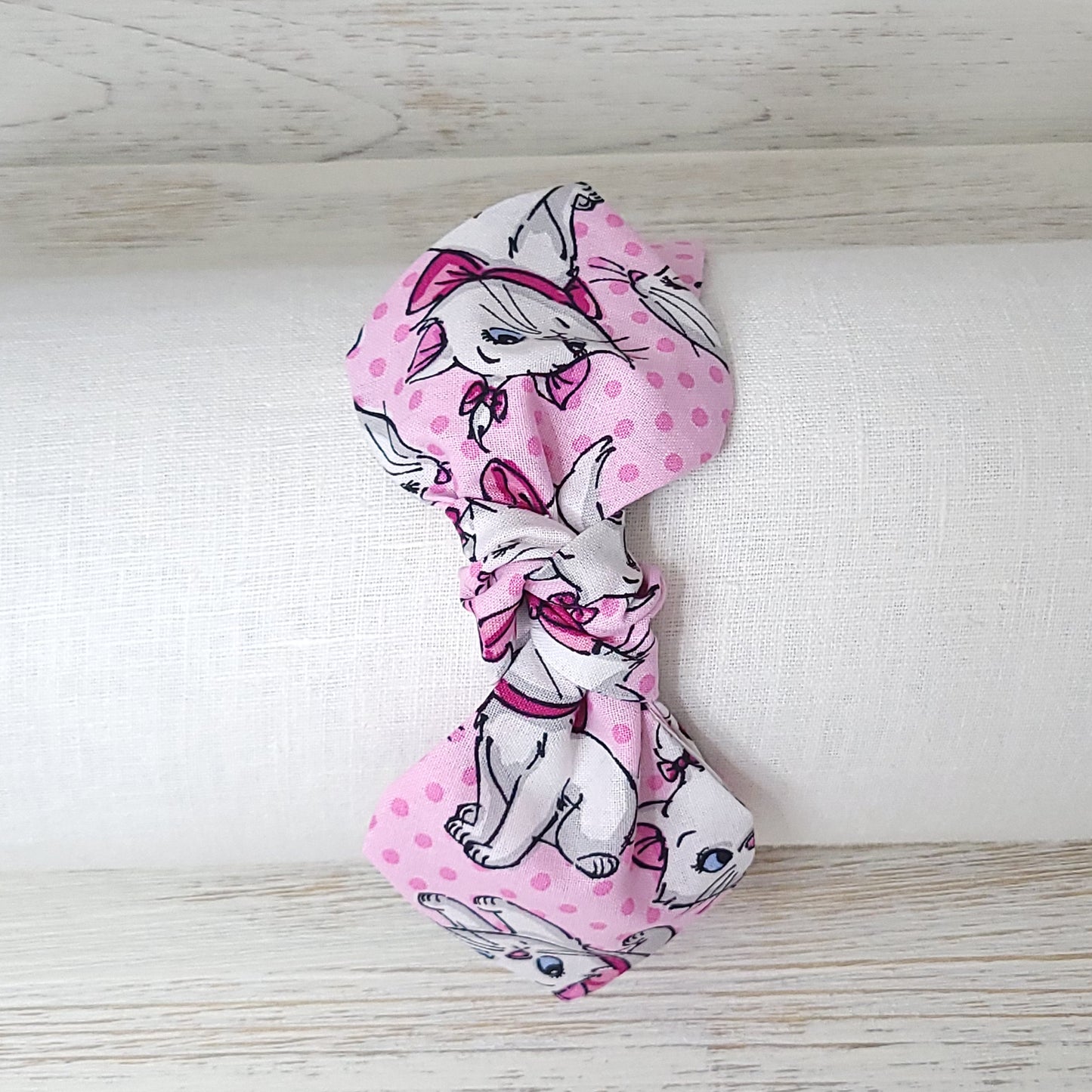 Aristocat Top Knot